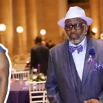 Horace Gilmore and Rhonda McCullough at formal event wearing elegant attire