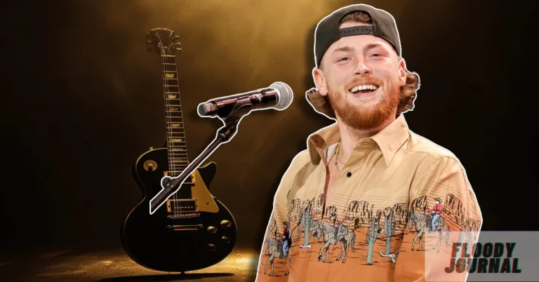 Bailey Zimmerman performing live on stage with guitar - country music star with growing net worth in 2025