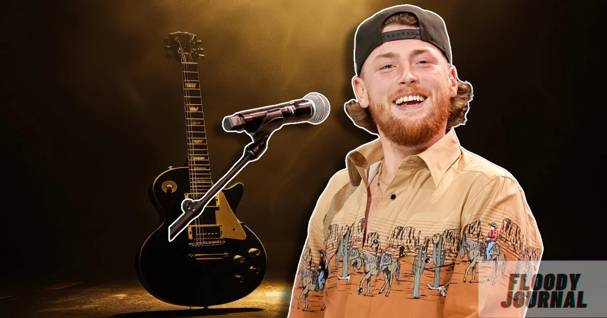 Bailey Zimmerman performing live on stage with guitar - country music star with growing net worth in 2025