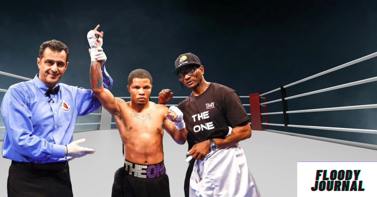 Demetris Fenwick celebrates boxing victory with referee and corner man in professional boxing ring